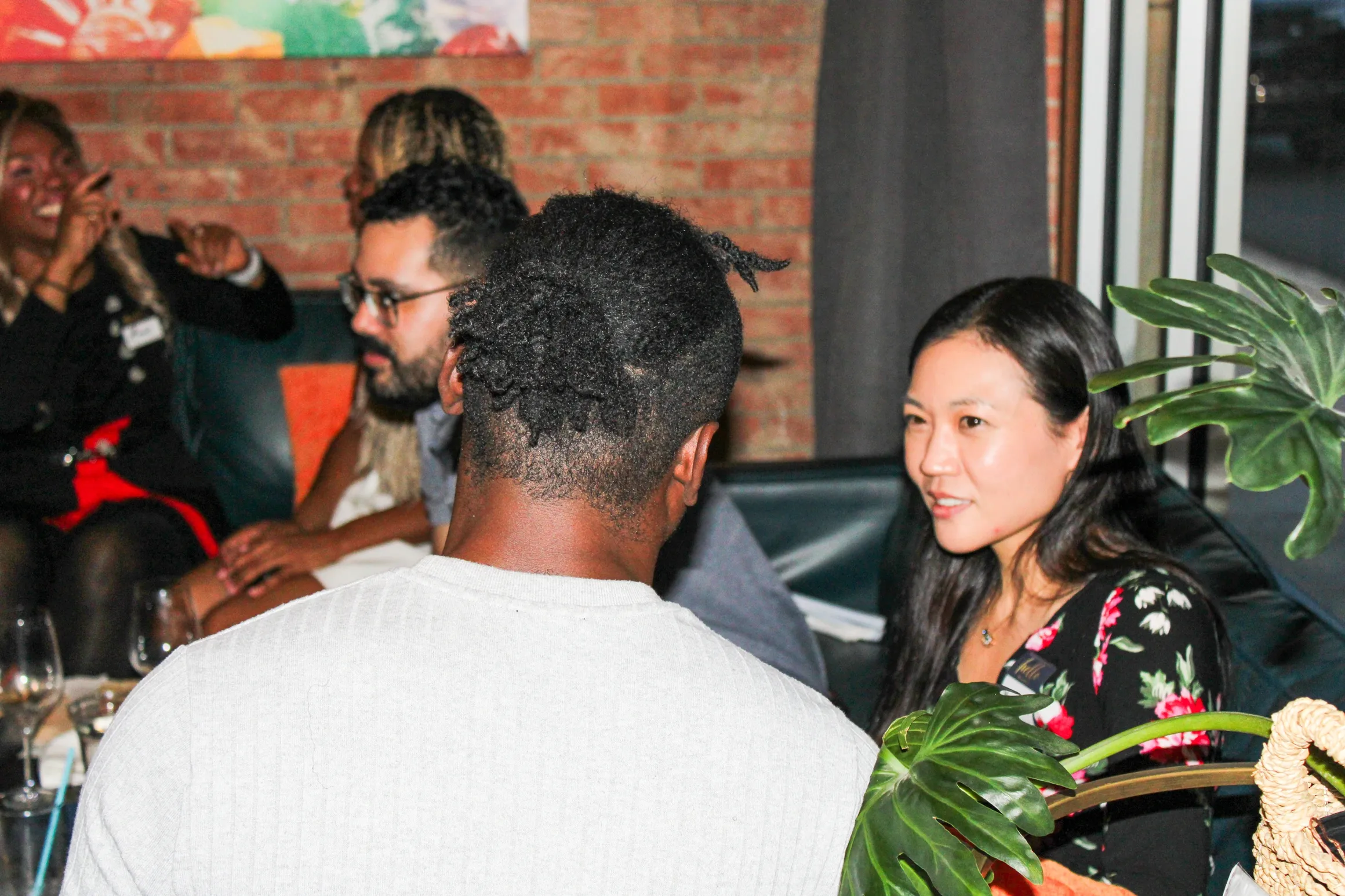 Tribe Academy cohort members connecting at a social event